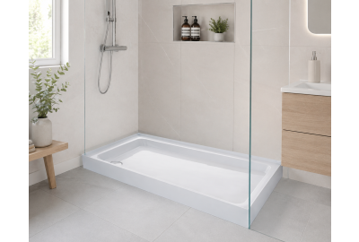 Modern bathroom with white upstand shower tray, glass screen, and beige tiles creating a clean minimalist design.