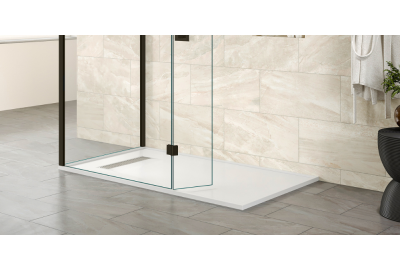 Cream bathroom with shower enclosure and shower tray